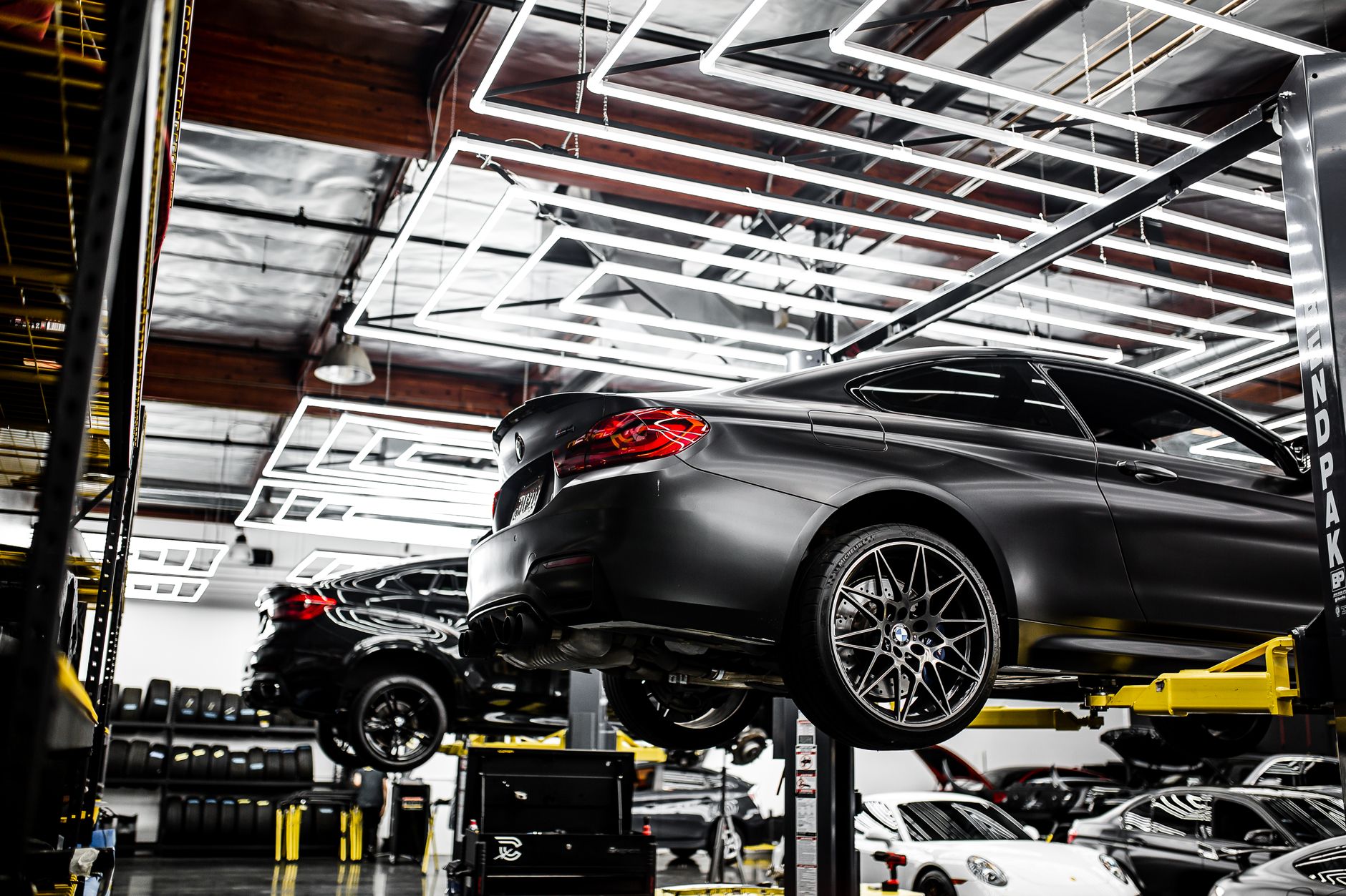 cars in car repair shop